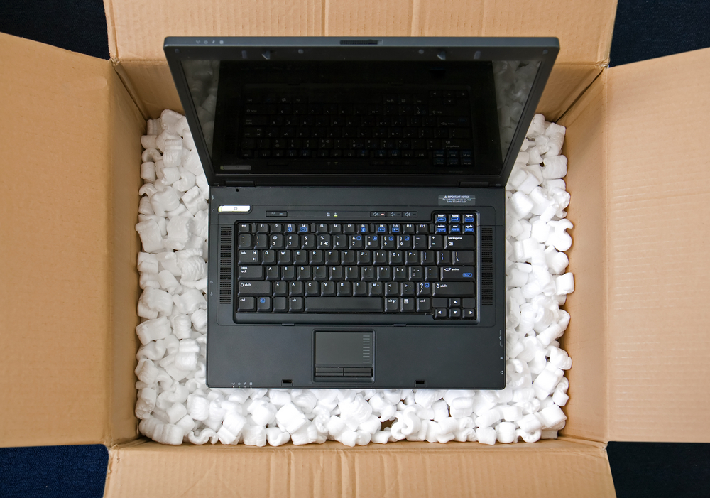 image of a computer being packed for a move or to be shipped